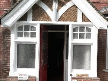 Redecorate timber porch on Victorian Mansion