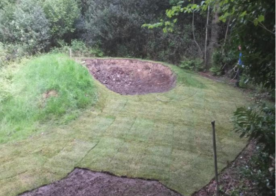 Turfing around large fire pit area